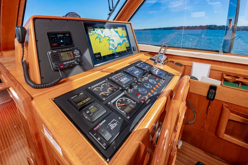 Slide: The Image of Helm of 2005 Grand Banks 49 Eastbay SX with navigation system. - 24