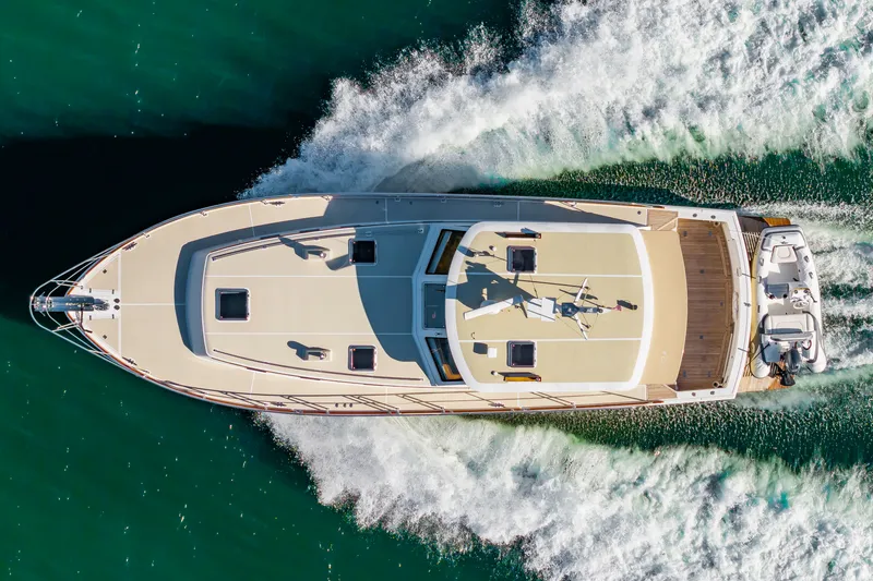 Slide: The Image of Aerial view of a 2005 Grand Banks 49 Eastbay SX yacht on the water. - 3