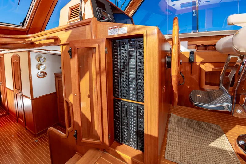 Slide: The Image of Interior of 2005 Grand Banks 49 Eastbay SX with wood paneling. - 31