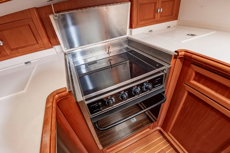 Slide: The Image of 2005 Grand Banks 49 Eastbay SX yacht kitchen stove - 35