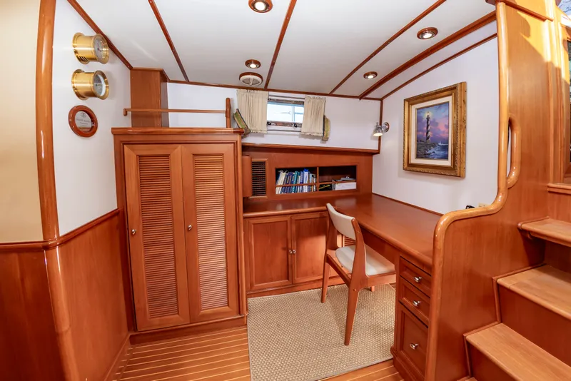 Slide: The Image of Interior of 2005 Grand Banks 49 Eastbay SX yacht with wooden furnishings. - 36