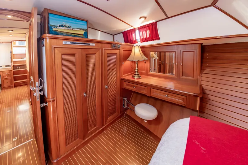Slide: The Image of Interior of 2005 Grand Banks 49 Eastbay SX yacht with wooden furnishings. - 40