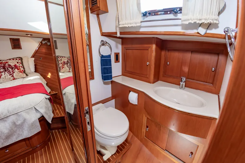 Slide: The Image of Luxurious bathroom and bedroom on Grand Banks 49 Eastbay SX 2005 yacht. - 42