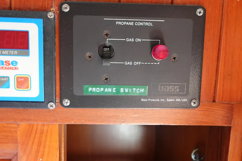 Slide: The Image of Propane control panel on 1985 Tayana 37 Cutter sailboat, featuring gas on/off switch. - 39
