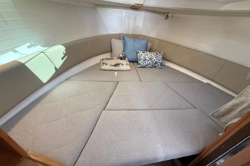 Slide: The Image of 2026 Cutwater C-288 CB cabin interior with cozy cushions and modern design. - 19