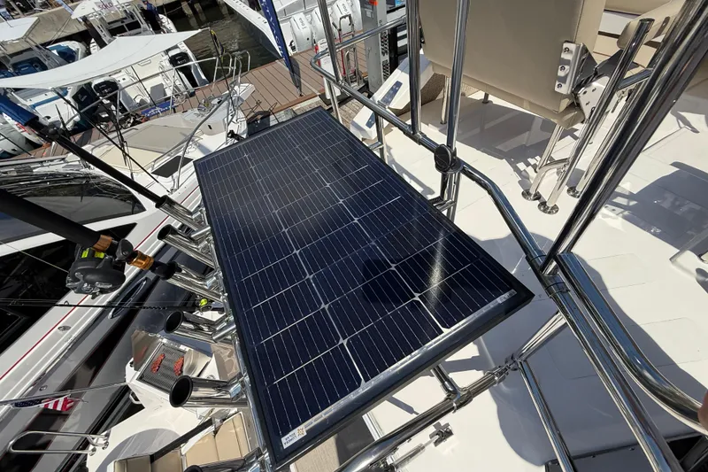 Slide: The Image of Solar panel on 2026 Cutwater C-288 CB boat, docked with other vessels. - 24