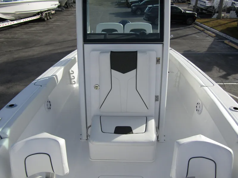 Slide: The Image of 2025 Wellcraft 243 Fisherman boat interior, featuring sleek white seating and modern design. - 12
