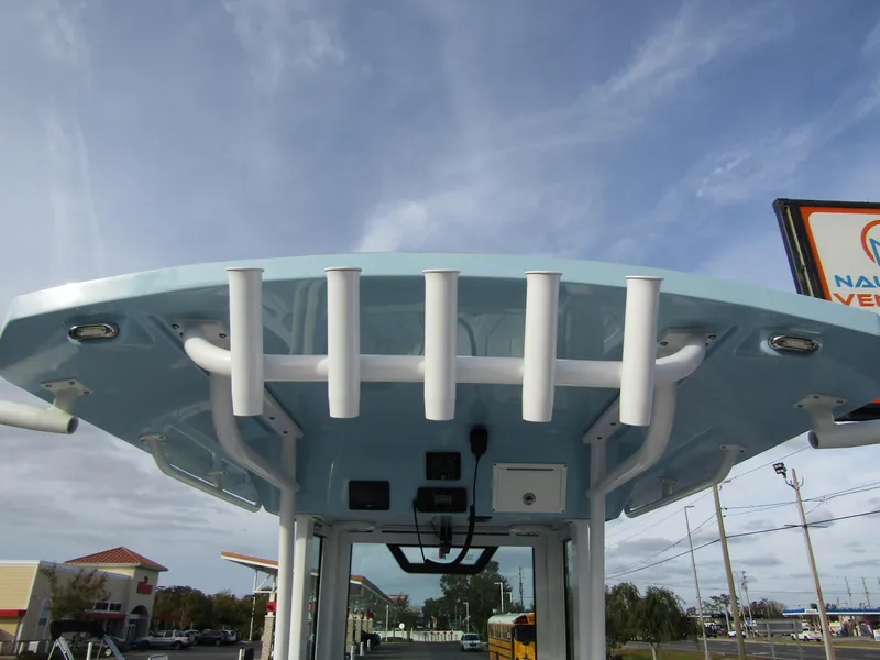 Slide: The Image of 2025 Wellcraft 243 Fisherman boat with rod holders and electronics, viewed from below. - 33