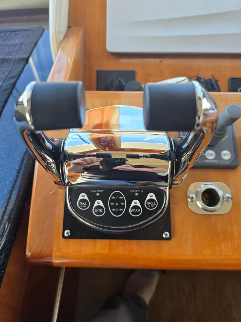 Slide: The Image of Control console of a 2005 Navigator 44C boat. - 13