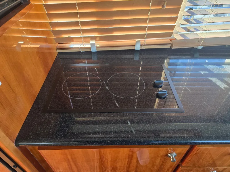 Slide: The Image of Kitchen area in a 2005 Navigator 44C with stove. - 20