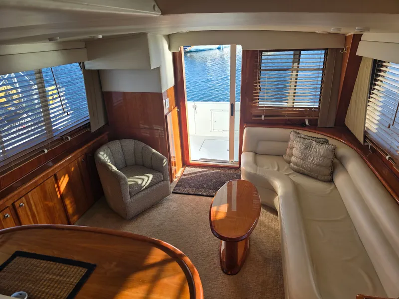 Slide: The Image of Interior of a 2005 Navigator 44C yacht with sofa and chair. - 25