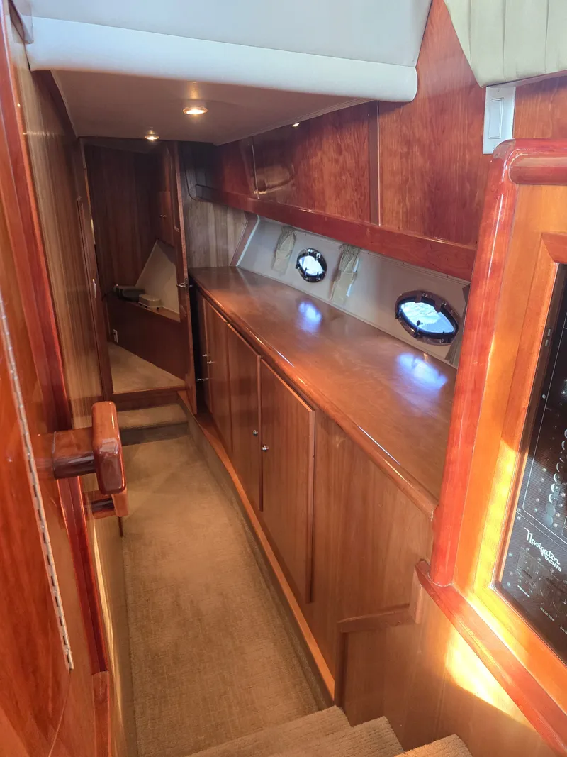 Slide: The Image of Interior of 2005 Navigator 44C yacht with wooden finish. - 27