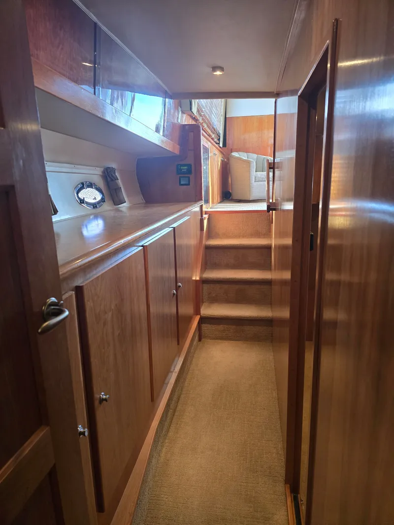 Slide: The Image of Interior of 2005 Navigator 44C yacht with wooden paneling. - 28