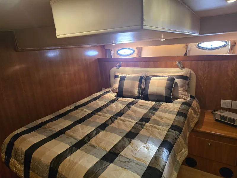 Slide: The Image of Luxurious bedroom in Navigator 44C yacht, year 2005. - 29