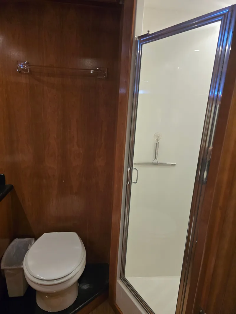 Slide: The Image of Bathroom in 2005 Navigator 44C with shower and toilet. - 32