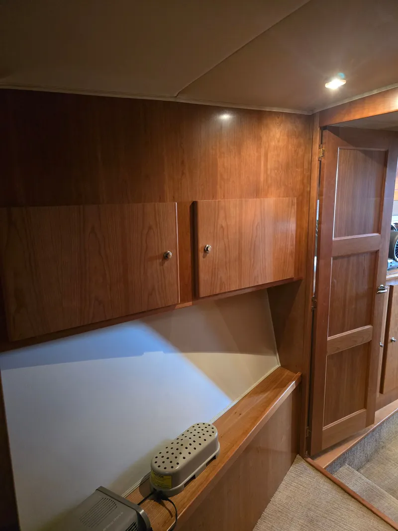 Slide: The Image of Interior of 2005 Navigator 44C yacht with wooden paneling. - 35