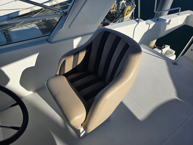Slide: The Image of Beige captain's chair on a 2005 Navigator 44C yacht. - 4