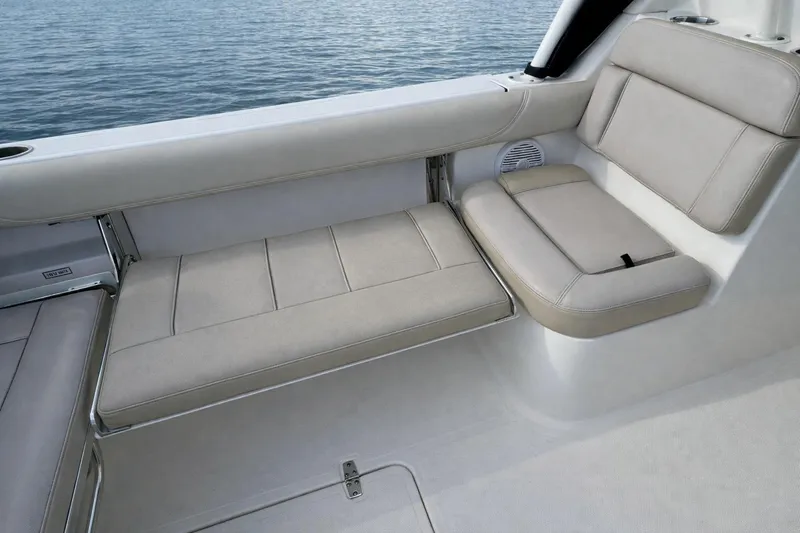 Slide: The Image of 2015 Pursuit DC 265 Dual Console boat sink with faucet and cover. - 6