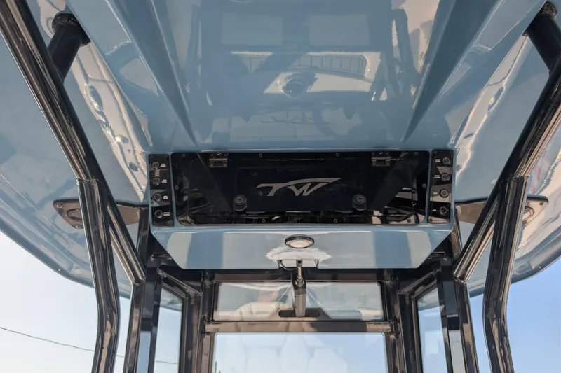 Slide: The Image of 2026 Tidewater 2500 Carolina Bay boat console with sleek design and modern features. - 6