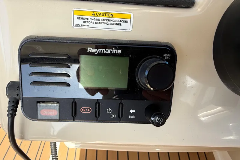 Slide: The Image of Control panel of 2020 Boston Whaler 320 Vantage with navigation display. - 39