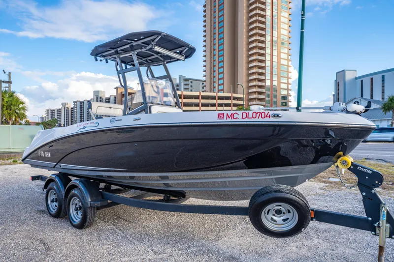 Slide: The Image of Yamaha Boats 2019 210 FSH Sport at Orange Beach Boat Sales, offering inspections and financing. - 4