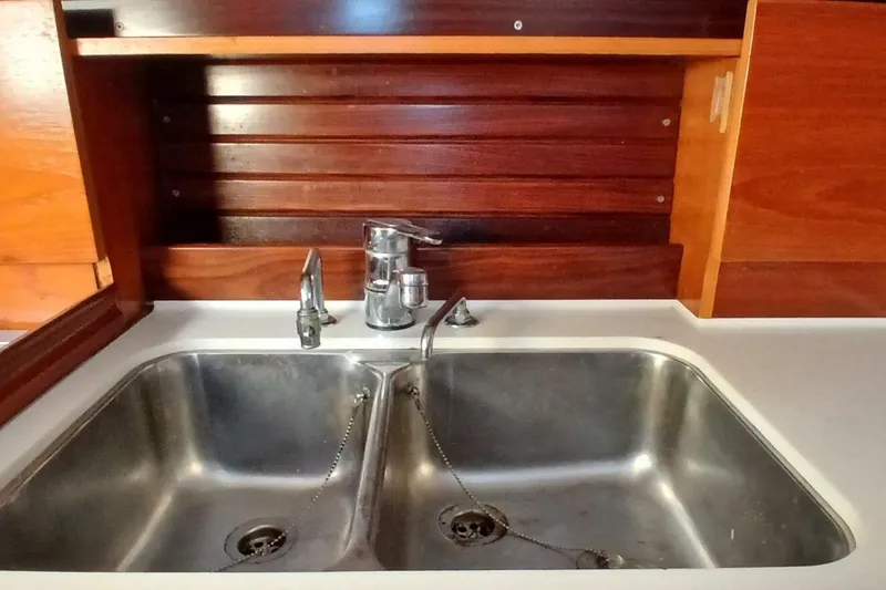 Slide: The Image of Stainless steel double sink in 1994 Beneteau Oceanis 44 CC yacht kitchen. - 29