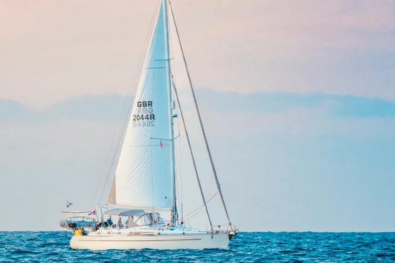 Slide: The Image of Sailing yacht Beneteau Oceanis 44 CC, 1994 model, cruising on open sea. - 3