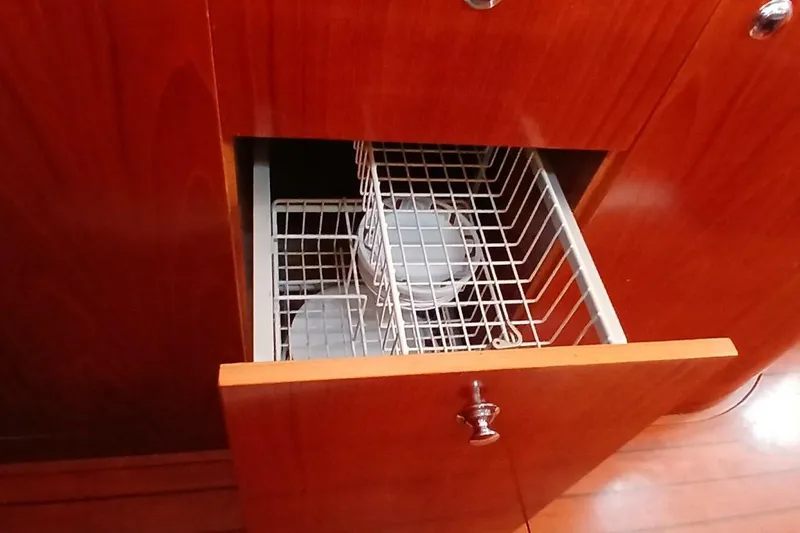 Slide: The Image of Open drawer with wire rack in 1994 Beneteau Oceanis 44 CC yacht interior. - 30