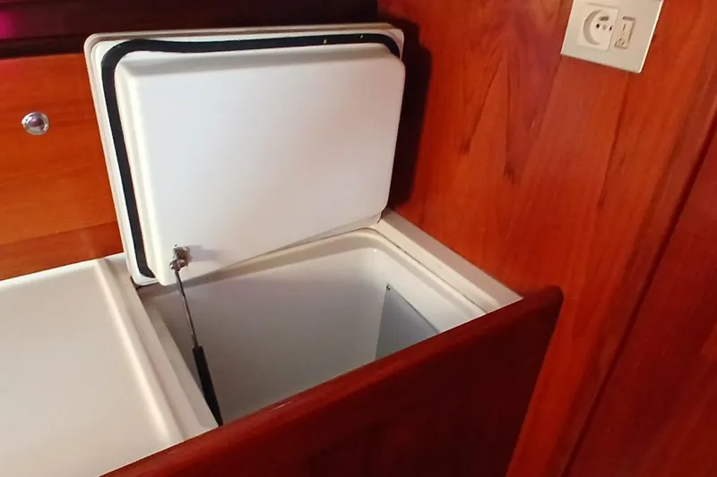 Slide: The Image of Open storage compartment in 1994 Beneteau Oceanis 44 CC yacht interior. - 37