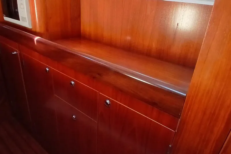 Slide: The Image of Interior wood cabinetry of 1994 Beneteau Oceanis 44 CC sailboat. - 38
