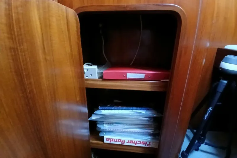 Slide: The Image of Wooden cabinet interior on a 1994 Beneteau Oceanis 44 CC sailboat. - 67