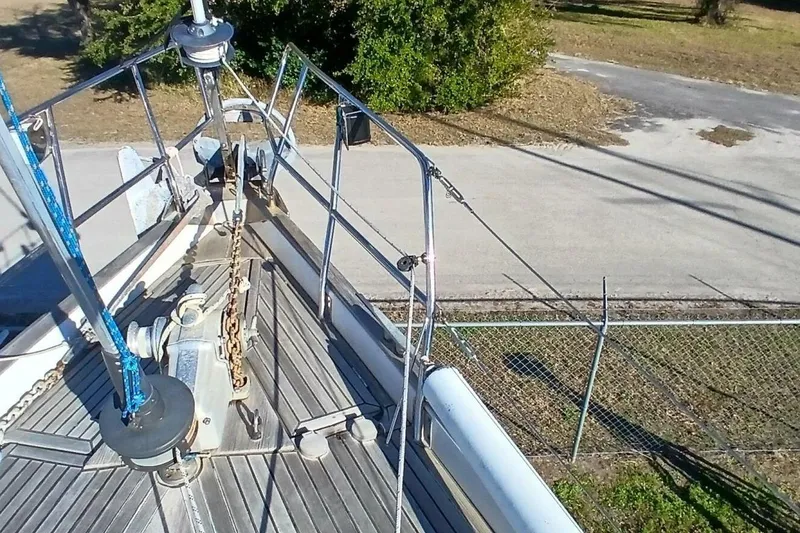 Slide: The Image of Bow view of 1994 Beneteau Oceanis 44 CC sailboat with anchor and deck details. - 85