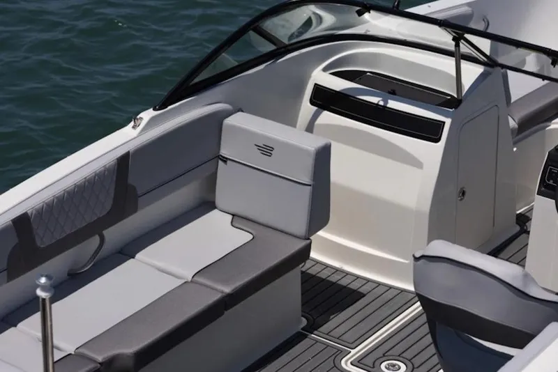 Slide: The Image of 2026 Bayliner VR4 Bowrider OB interior with sleek seating and modern design. - 6