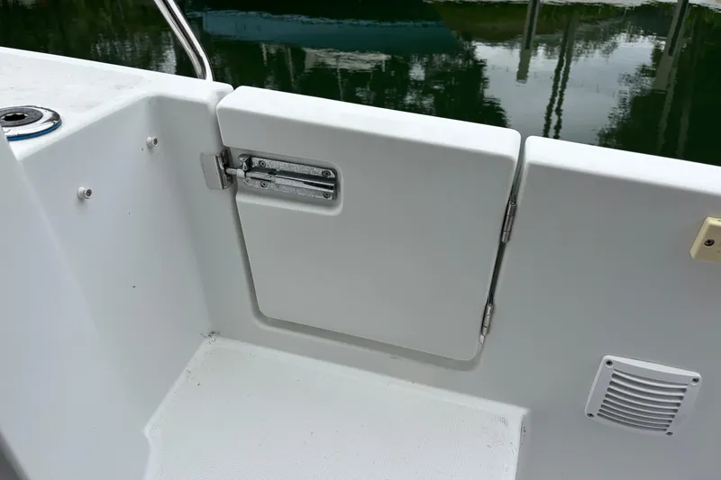 Slide: The Image of Control panel of 2022 Jeanneau NC 795 Series 2 with Yamaha branding and thruster joystick. - 19