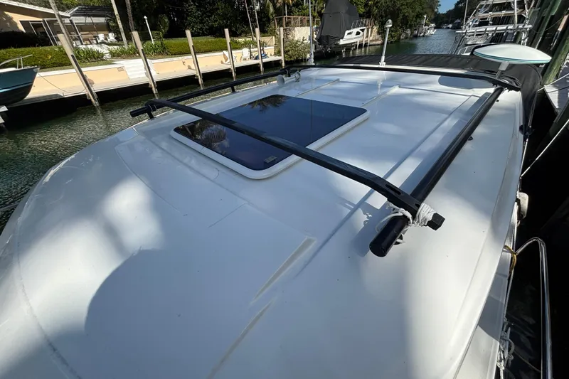 Slide: The Image of 2022 Jeanneau NC 795 Series 2 boat deck with white hatch and latch. - 23
