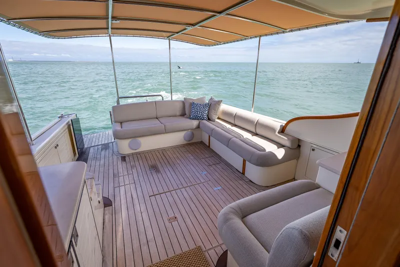 Slide: The Image of Luxurious 2018 Palm Beach Motor Yachts PB50 with spacious deck and ocean view. - 11