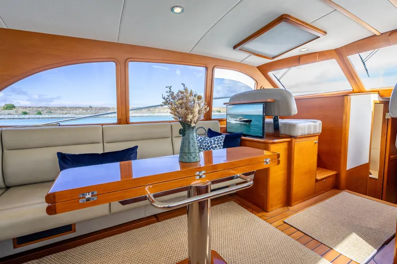 Slide: The Image of Luxurious interior of 2018 Palm Beach Motor Yachts PB50 with elegant wood finishes. - 12
