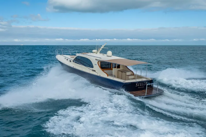 Slide: The Image of 2018 Palm Beach Motor Yachts PB50 cruising on open sea. - 0