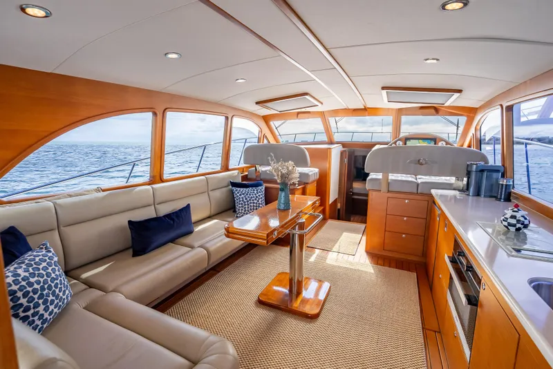 Slide: The Image of Luxurious 2018 Palm Beach Motor Yachts PB50 interior with elegant seating and ocean view. - 2