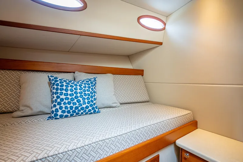 Slide: The Image of Luxurious cabin interior of 2018 Palm Beach Motor Yachts PB50 with stylish bedding and cushions. - 21