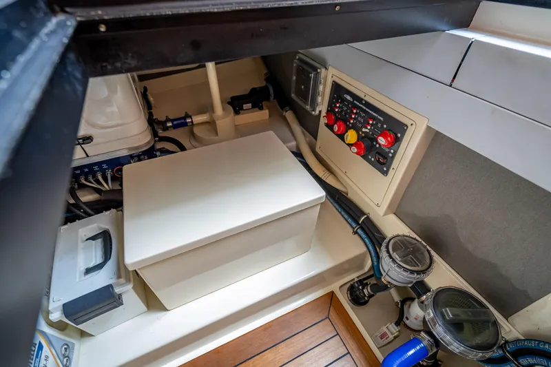 Slide: The Image of Engine room of 2018 Palm Beach Motor Yachts PB50 with control panel and equipment. - 29