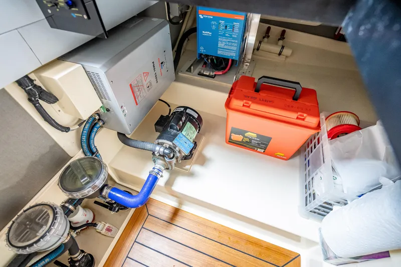 Slide: The Image of Engine room of 2018 Palm Beach Motor Yachts PB50 with equipment and storage. - 30