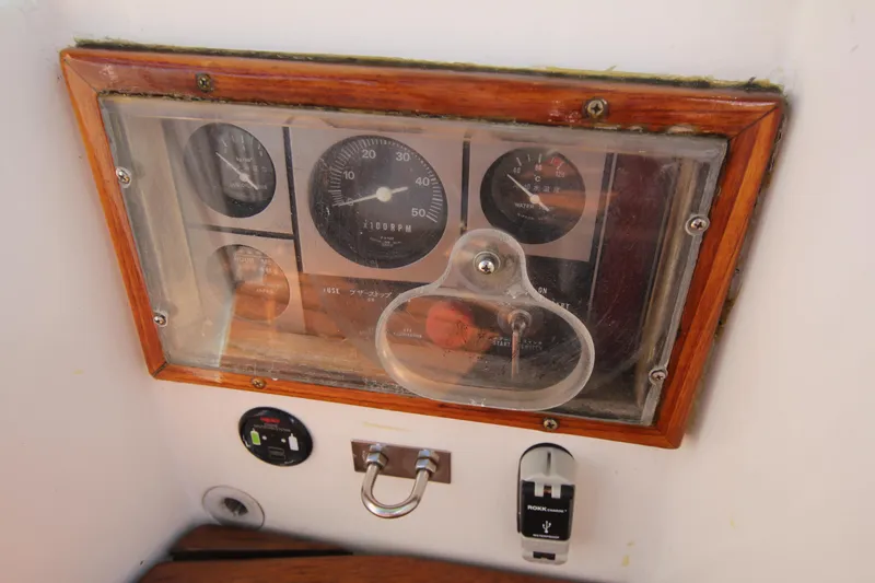 Slide: The Image of Instrument panel of a 1998 Able Apogee 50 sailboat with gauges and controls. - 15