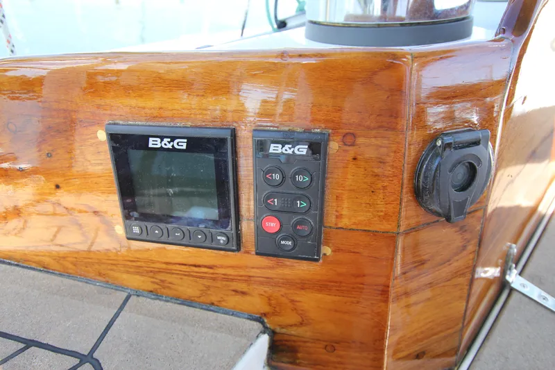 Slide: The Image of B&G navigation equipment on 1998 Able Apogee 50 yacht's polished wooden dashboard. - 16