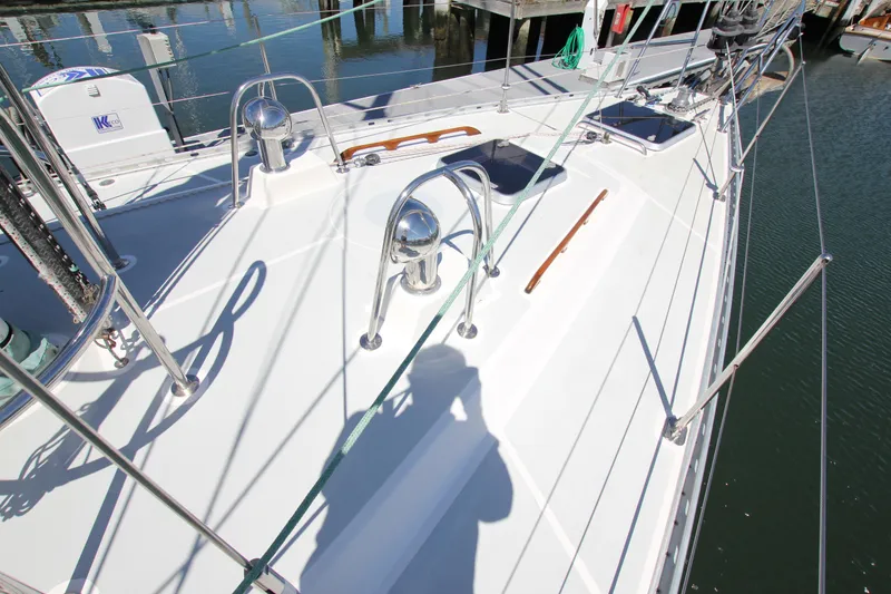 Slide: The Image of Deck of 1998 Able Apogee 50 sailboat with polished fittings and ropes. - 4