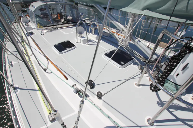 Slide: The Image of Deck view of 1998 Able Apogee 50 sailboat, featuring sleek design and rigging details. - 8
