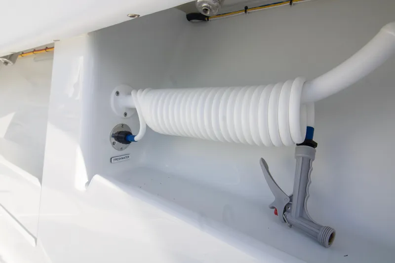 Slide: The Image of Freshwater hose system on 2026 Invincible 39 Open Fisherman boat. - 12