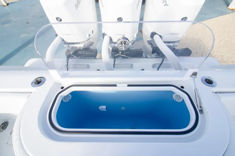 Slide: The Image of 2026 Invincible 39 Open Fisherman boat with triple Mercury engines and livewell. - 20