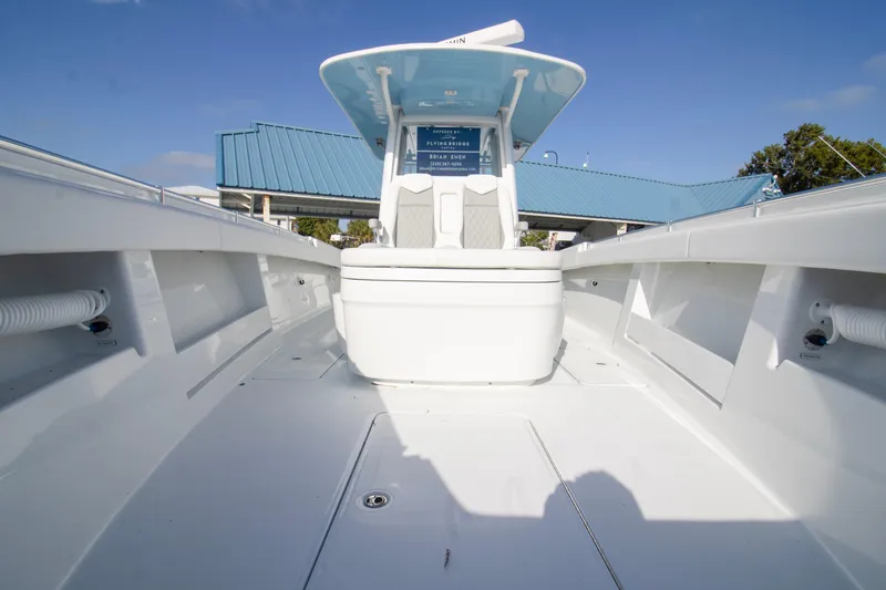 Slide: The Image of 2026 Invincible 39 Open Fisherman boat interior, showcasing spacious deck and modern design. - 7