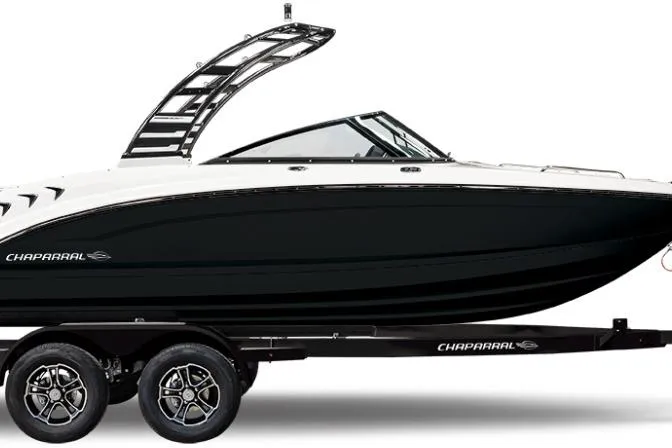 The Image of 2026 Chaparral GTS 3 boat on trailer, sleek black and white design. - 0